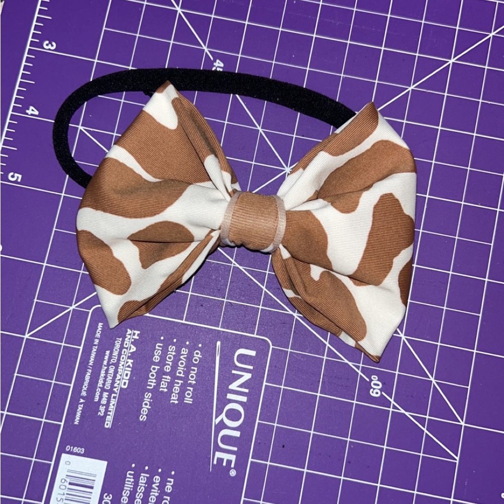Cow print baby bow
